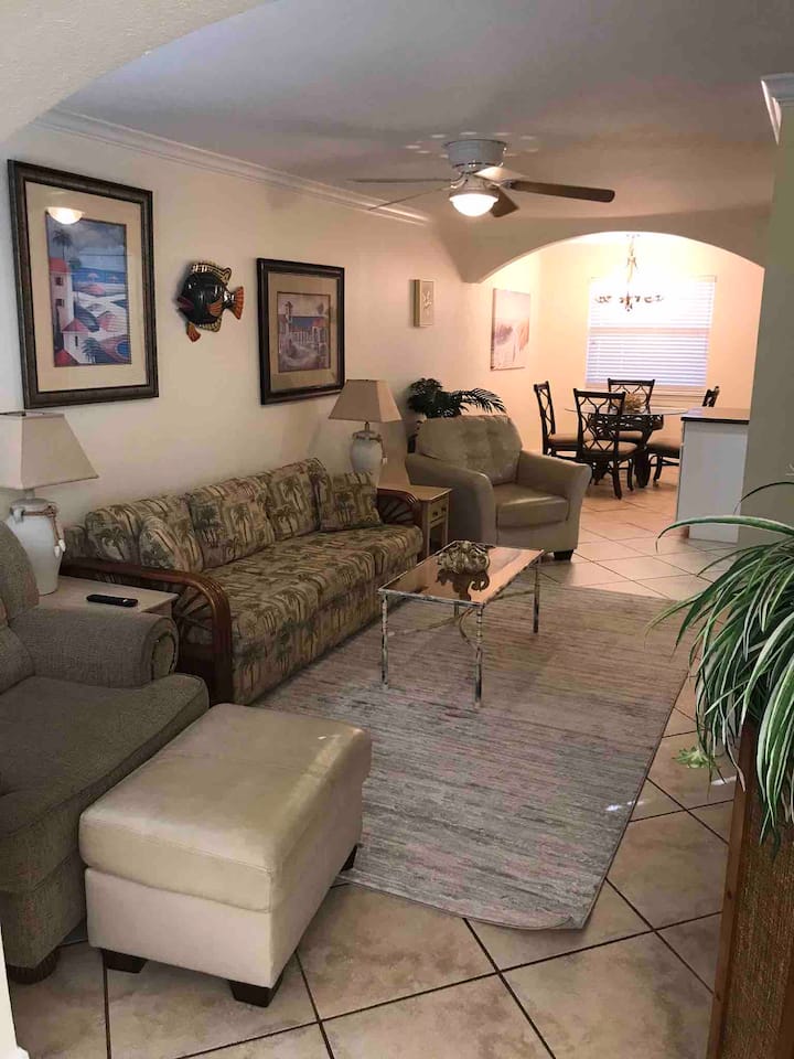 Living room with queen pullout and big screen tv