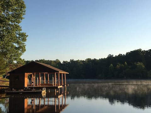 Five lakefront log homes, 2 pvt docks, sleeps 36