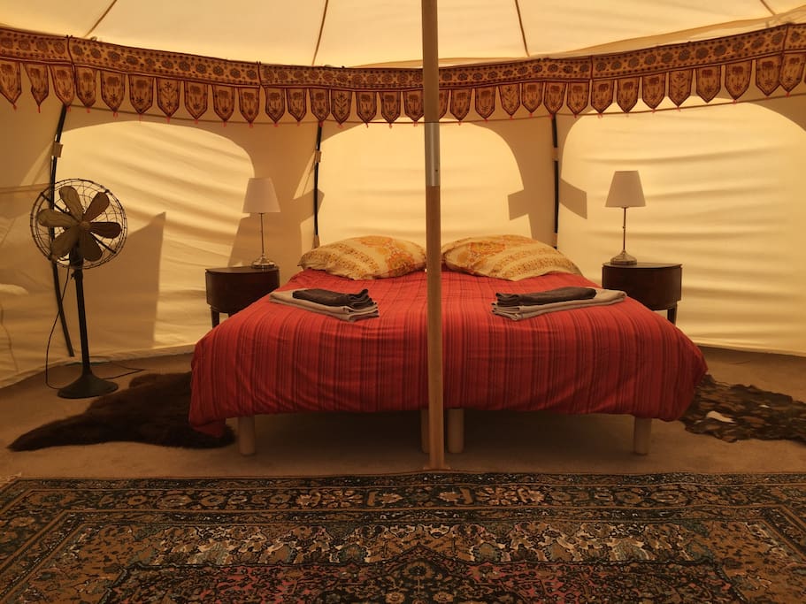 In the orange tent....