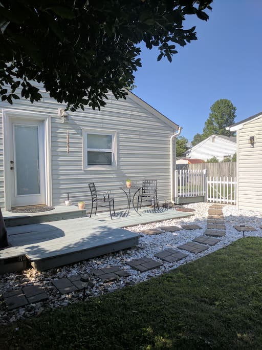 Patio with table and chairs available.