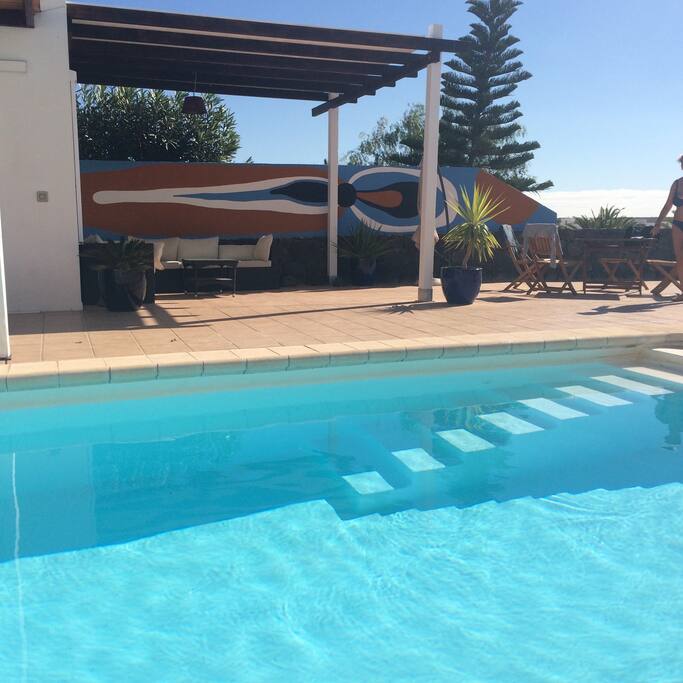 The pool and outside terrace with view on the sea and on the volcanoes
