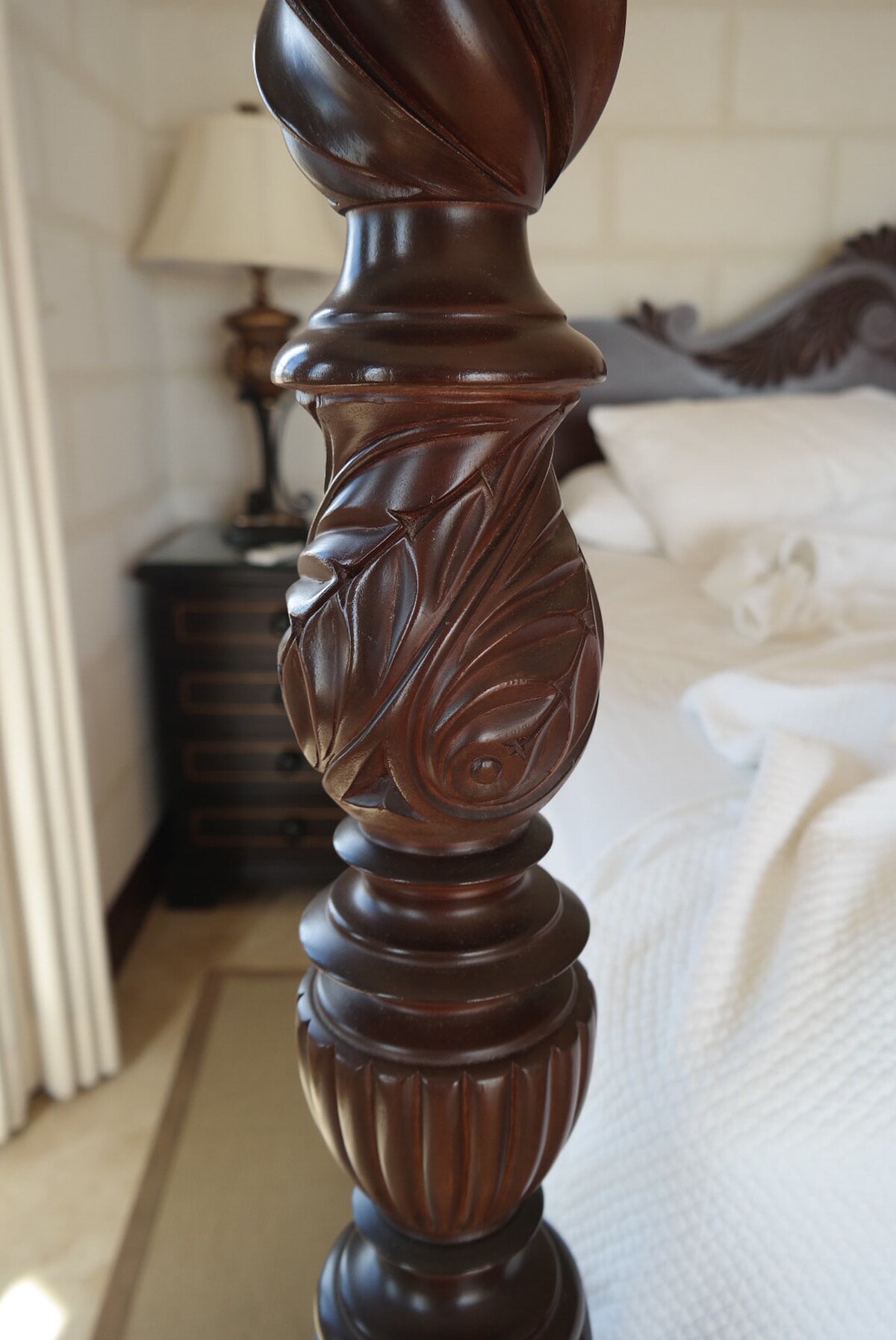 They say it's all in the details: Hand-crafted mahogany four-poster beds