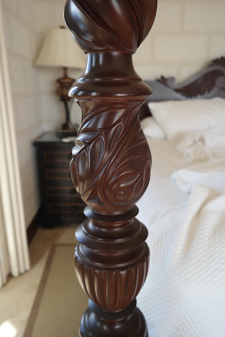 They say it's all in the details: Hand-crafted mahogany four-poster beds