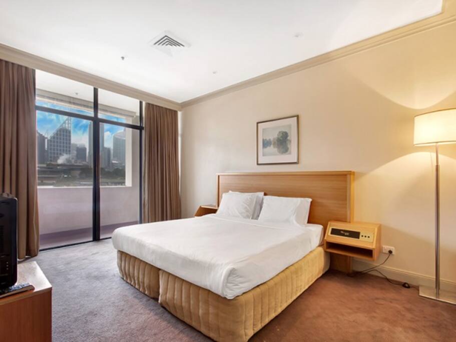 King sized master bedroom with ensuite bathroom and walk in waldrobe