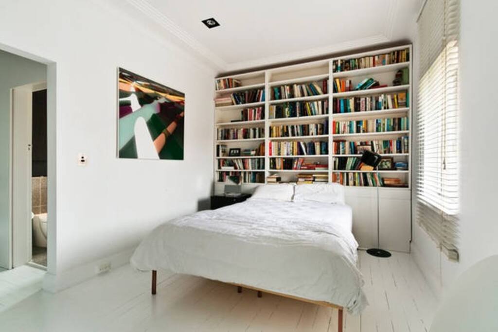 :: Bondi Beach Bespoke ::
your beautiful bespoke bedroom with library feel ::
If you are looking for a fun, unique, local experience in Bondi..this is it!! The top floor apartment is conveniently located 5 minutes away from the beach and is everything you need to enjoy Sydney. The place is super clean, very artsy, and Nic is a fabulous host. She really goes out of her way to make sure her place is comfortable for her guests. … I absolutely loved staying here!! :: Wenting Mar 2016