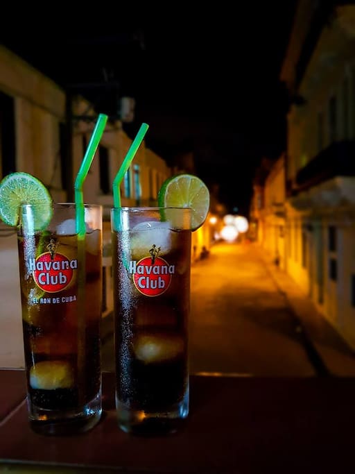 cuba libre drinks at night from our balcony