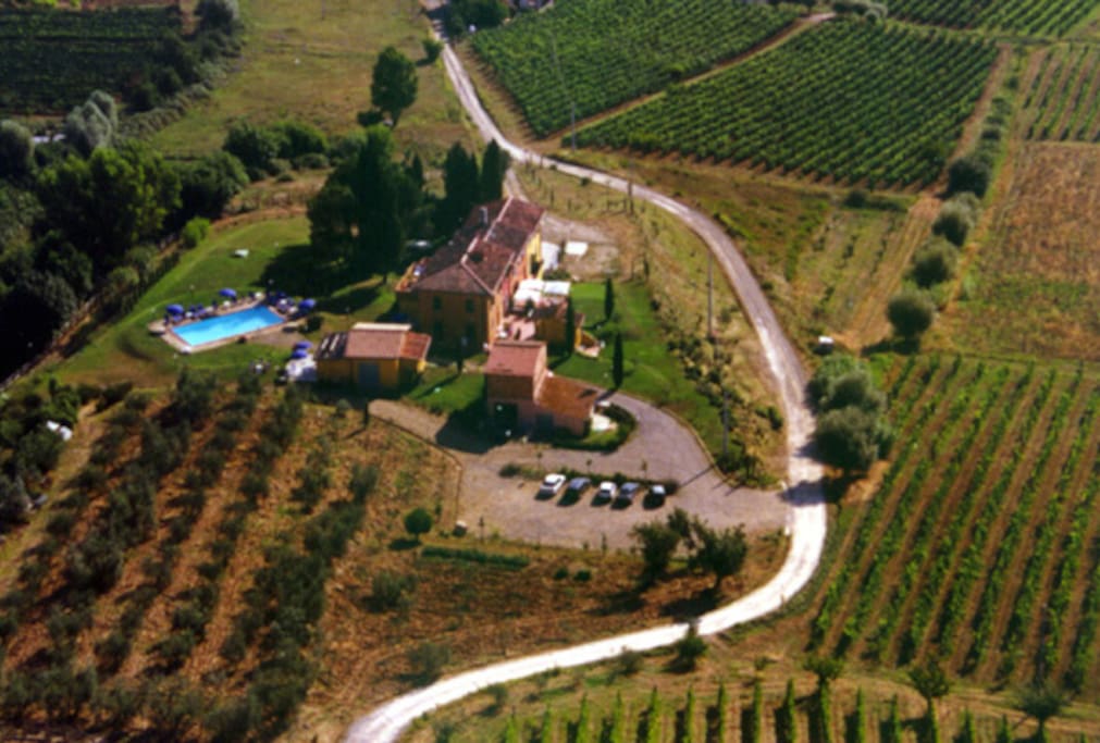 all surrounded by vineyards and olive grows