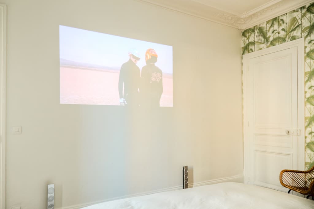 Home cinema facing the bed