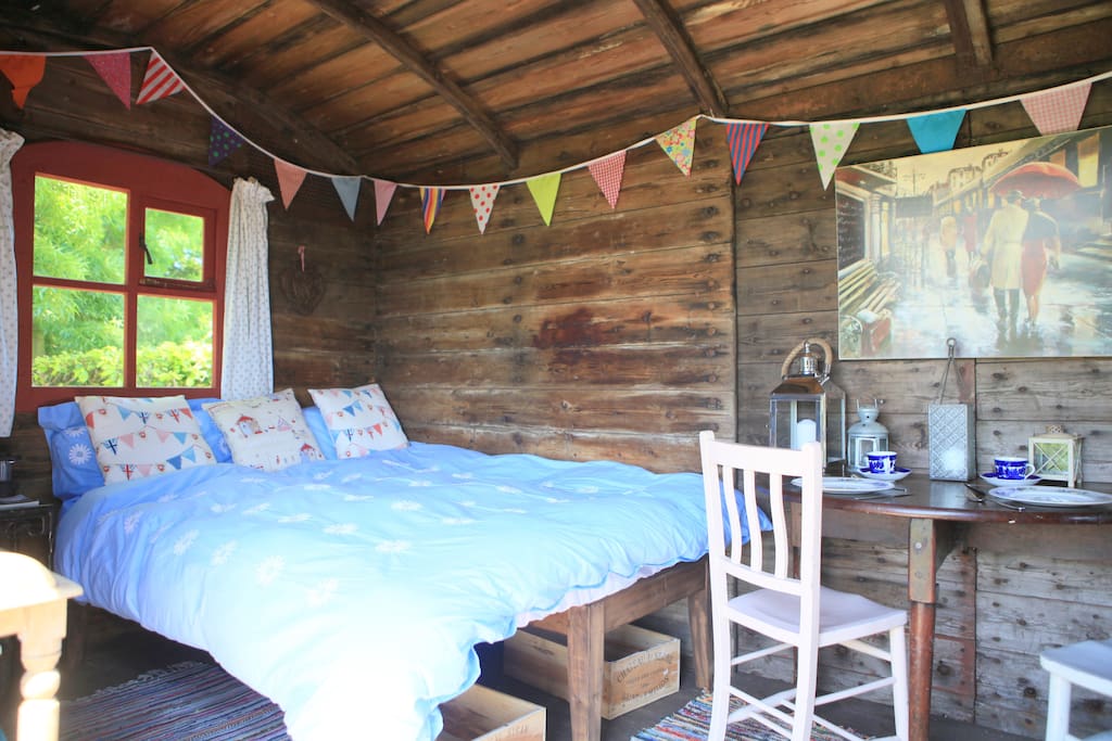 Double bed and dining area