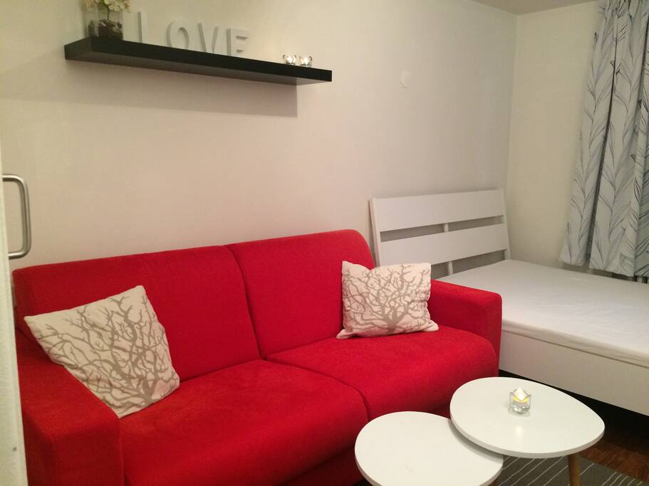 The bedroom and living room