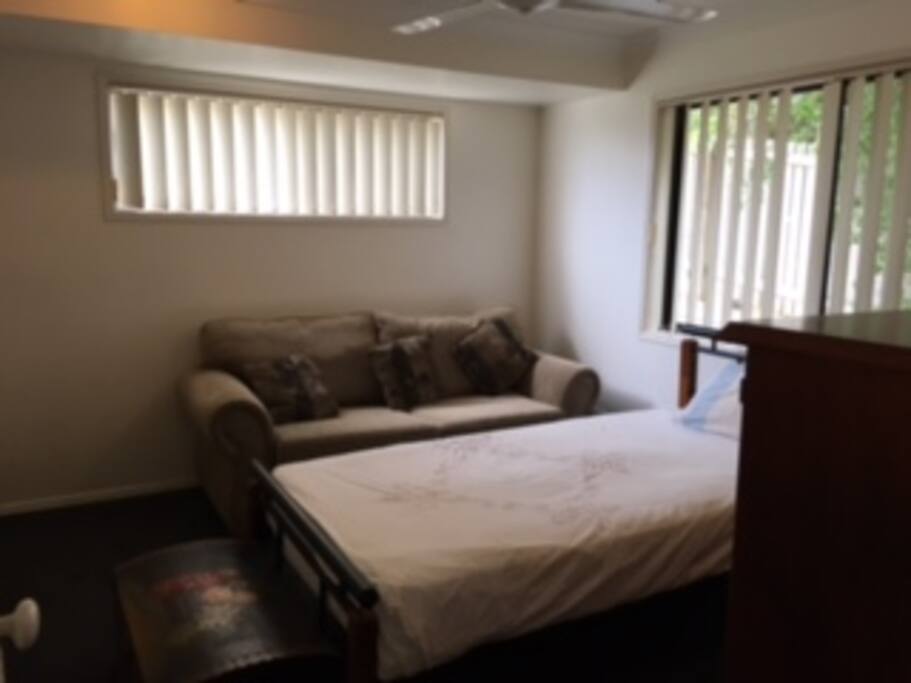 Downstairs - Bedroom 2 - Single bed, air-conditioned, fan and built-ins.