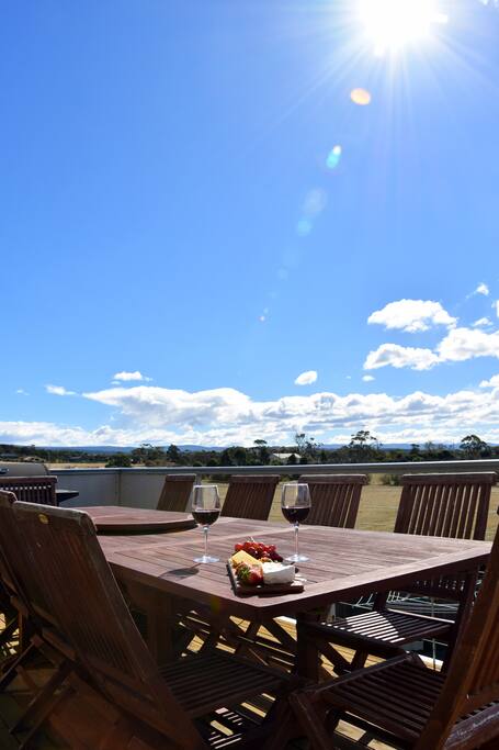 BBQ deck with rural views and the sun set.