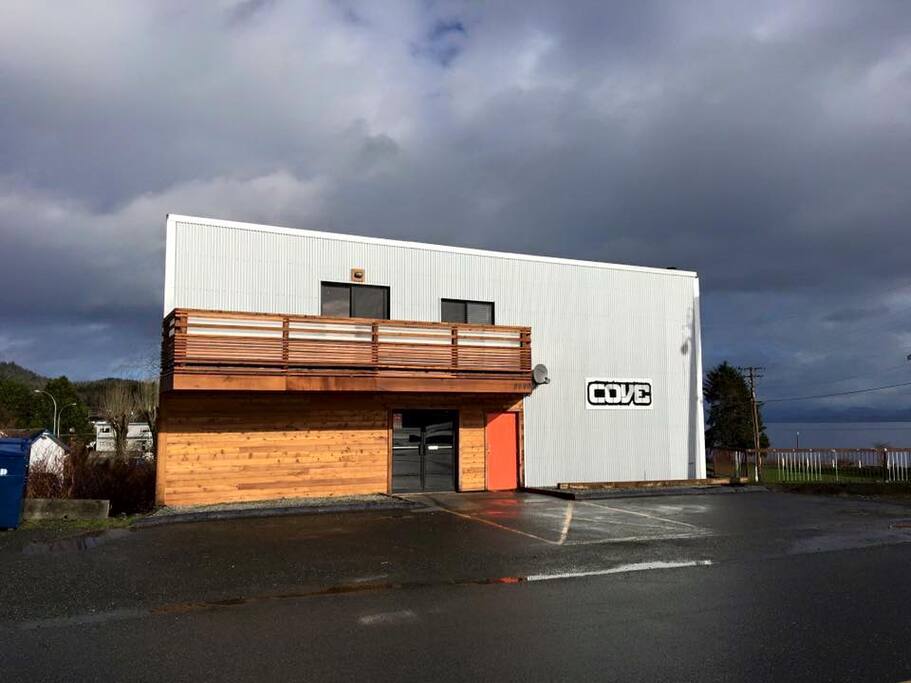 Unit is located through side door and is on back side of building overlooking seawall and ocean