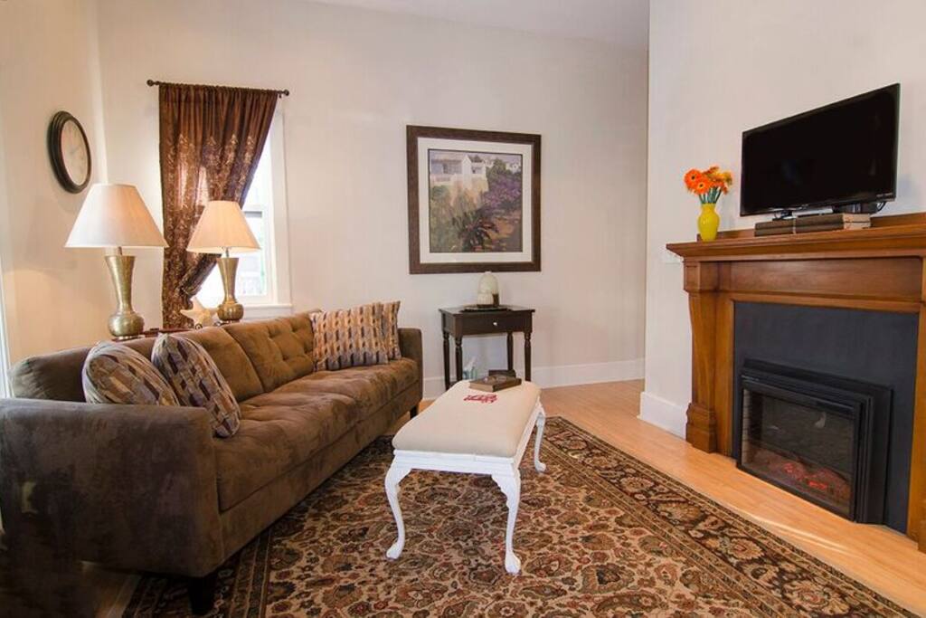 Roomy living room with electric fireplace