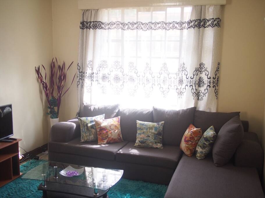 Spacious living room with internet, cable and reading/ meals table