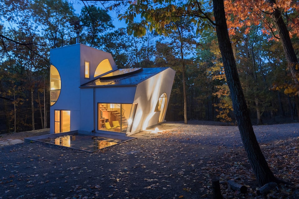 Architectural wonder in the woods, an AirBnB destination for travelers.