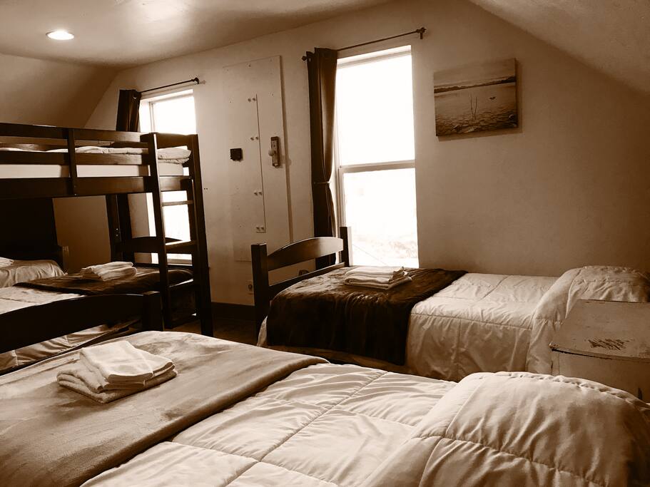 7-bed dorm room; 2 beds are not shown in the picture. (Upstairs)