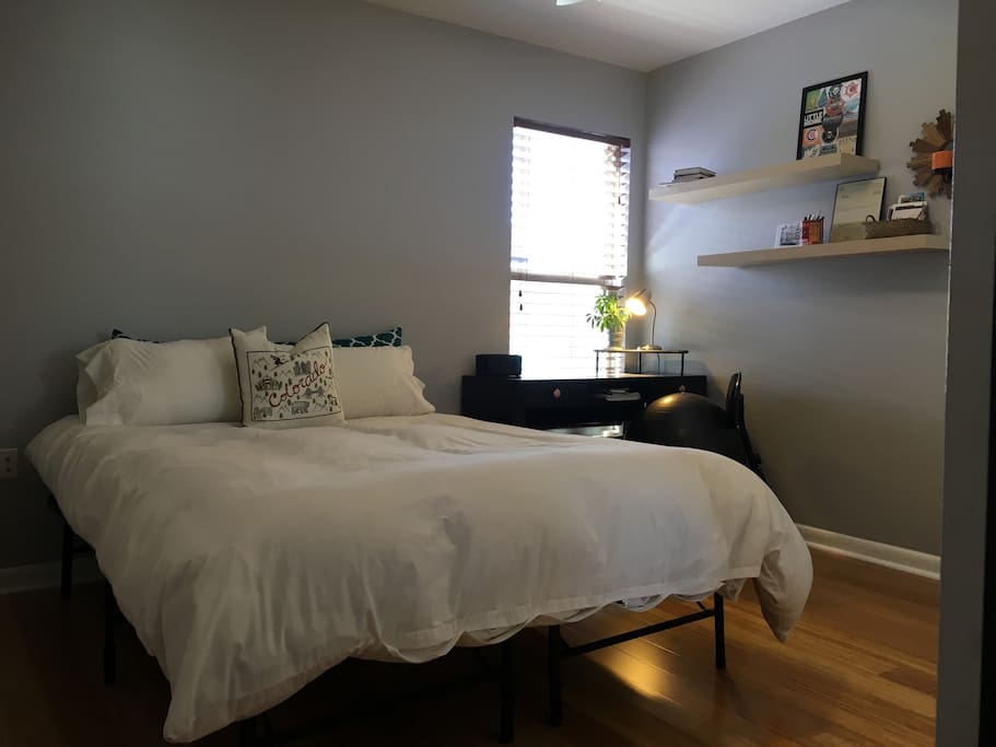 Spacious room with comfy queen-sized bed.