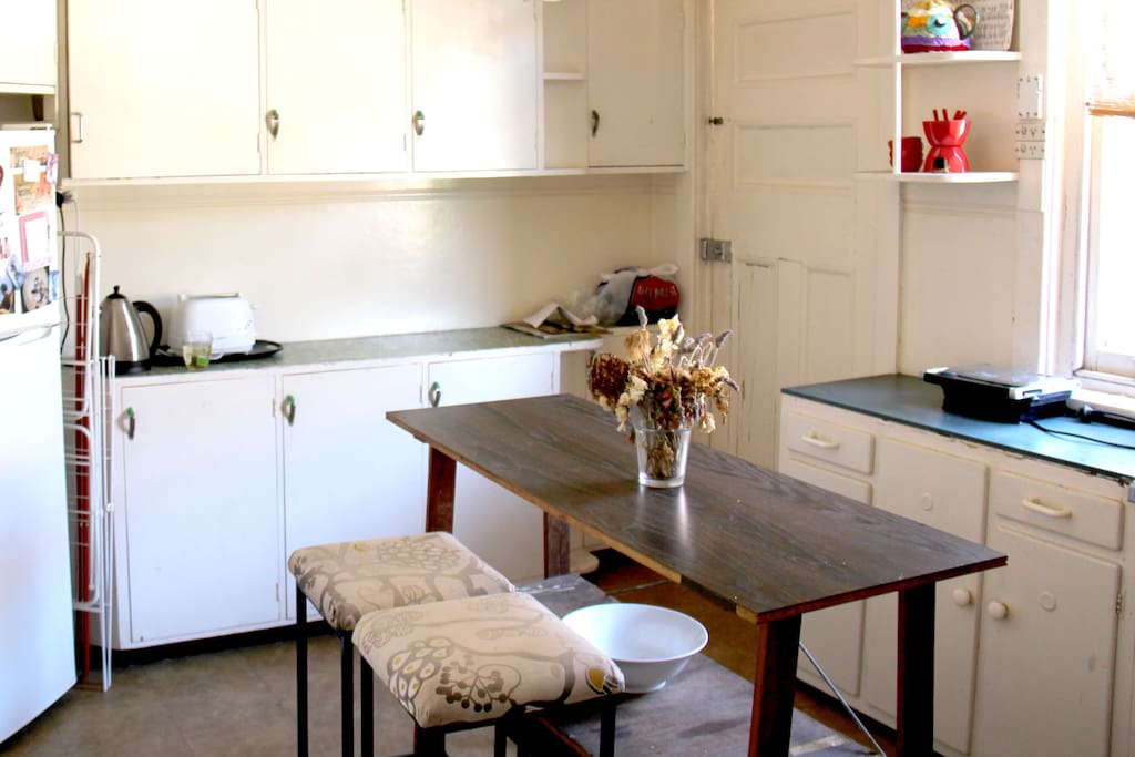 Retro Style Kitchen with oven, stove, kettle, sandwich press and fridge