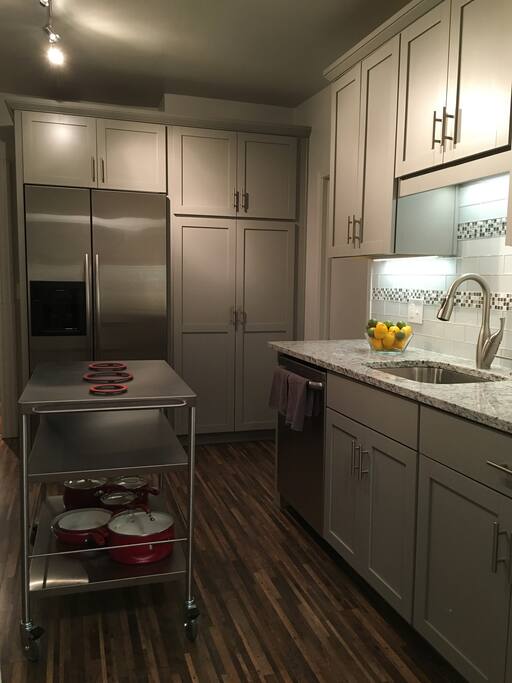 Granite counter tops, glass and tile back splash.