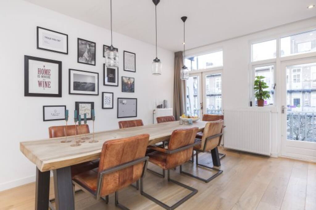 The large dining table is the perfect place to eat, drink, socialize, work, be creative etc.. :)