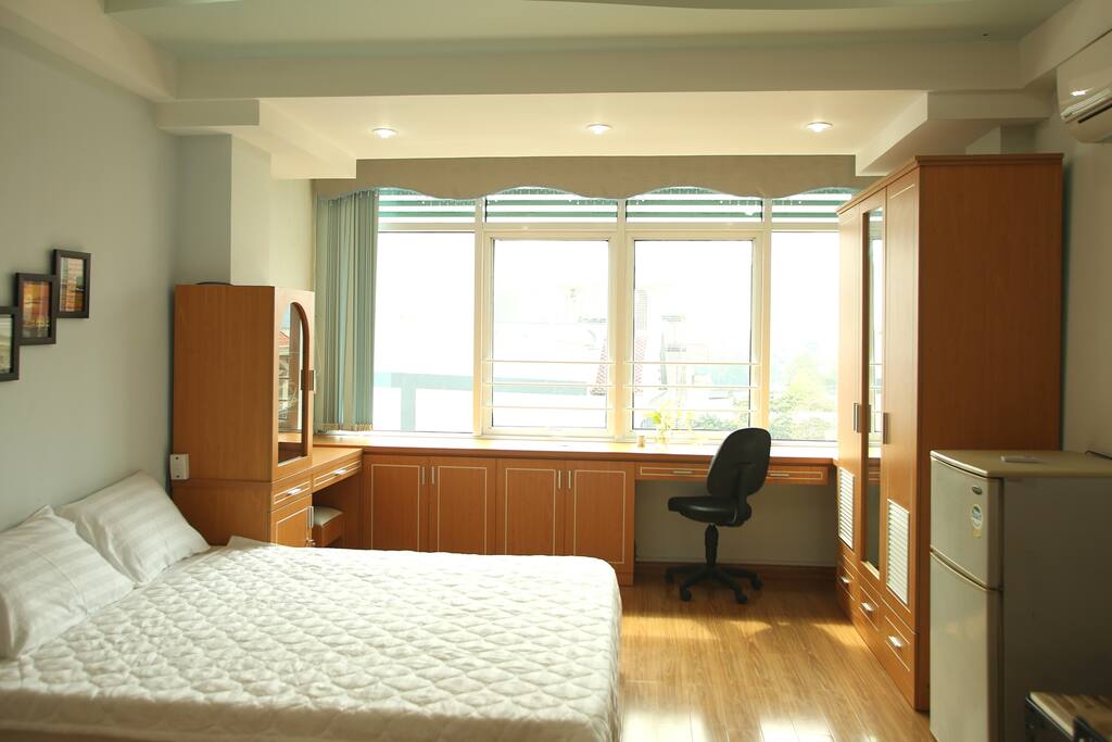 The cozy studio with full necessary amenities: nice decor closet, hangers, comfortable double bed, iron, working desk, dinning table, television, water- tea- coffee.