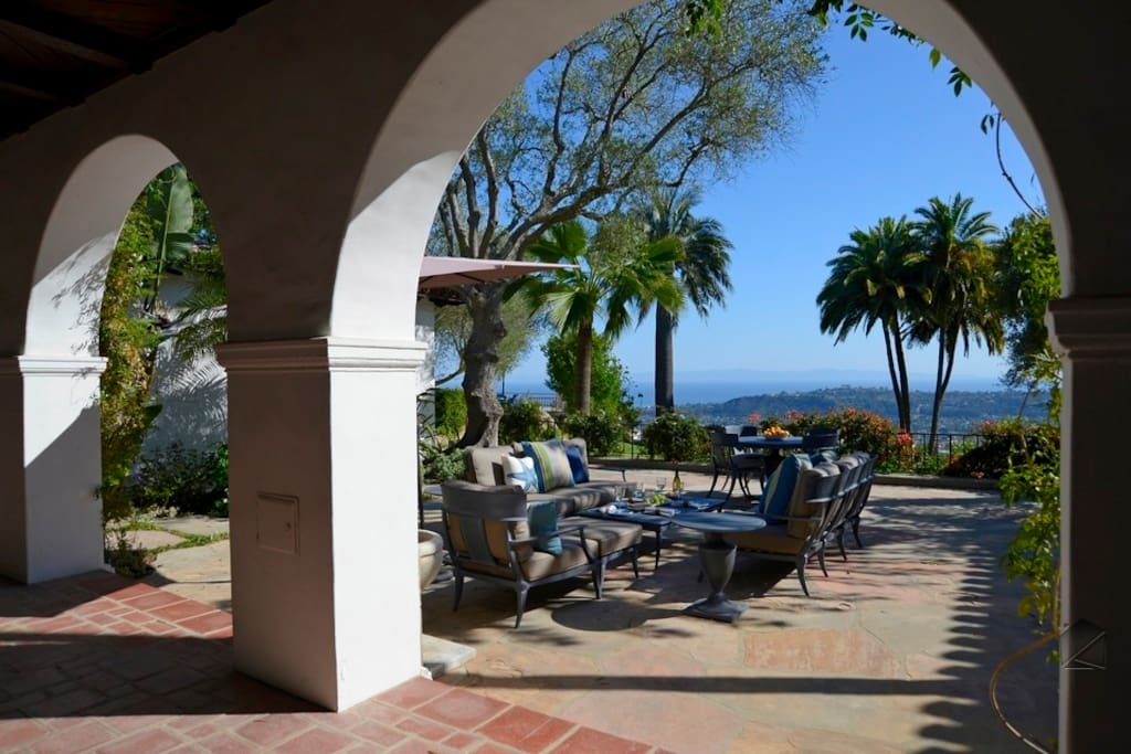 The courtyard, with views of the city and ocean below, is the perfect spot for dining and drinks.