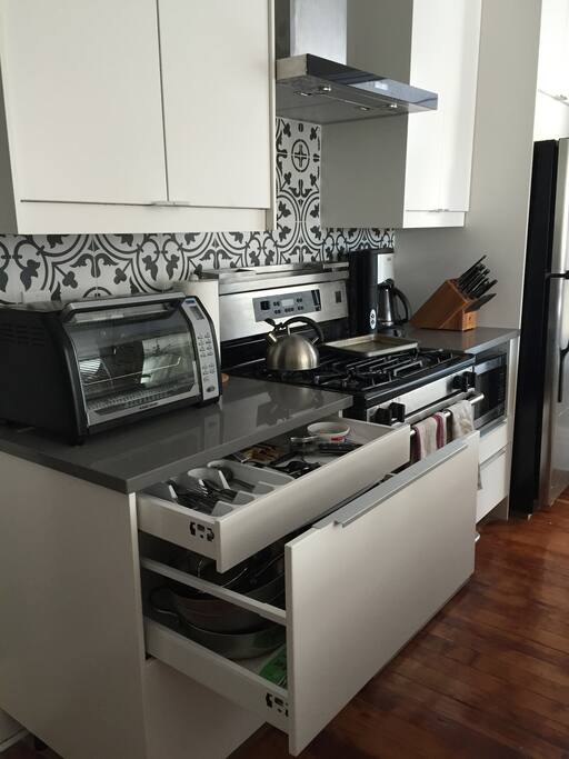 well equipped kitchen with gas stove for gourmet cooking
