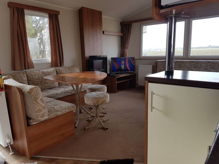 lounge looking out into a quiet open plan field