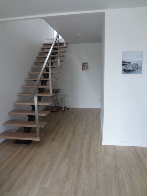 Internal Stairs leading to large open plan living area.