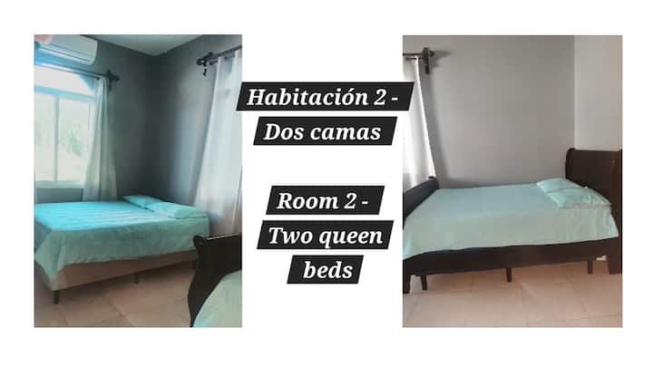 Habitacion 2  con dos camas queen en segundo piso y aire aicondicionado