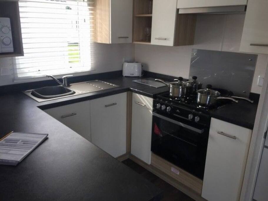 A well appointed kitchen if you feel like cooking, Papa Johns Pizza onsite if you don't!