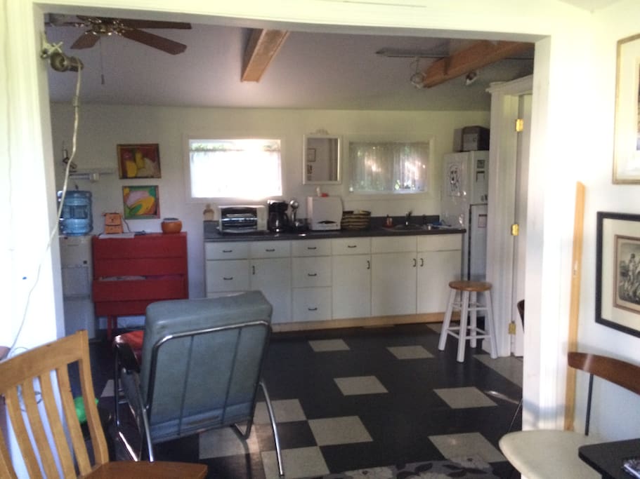 Kitchenette with sink and refrigerator
