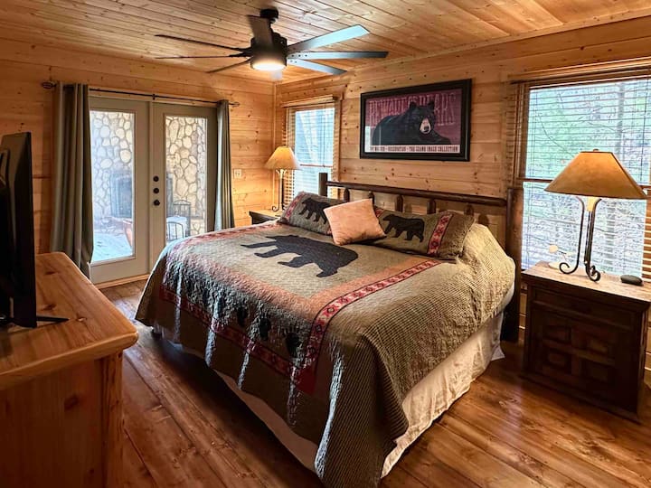 Main level bedroom with deck access and walk-in closet (not photographed)