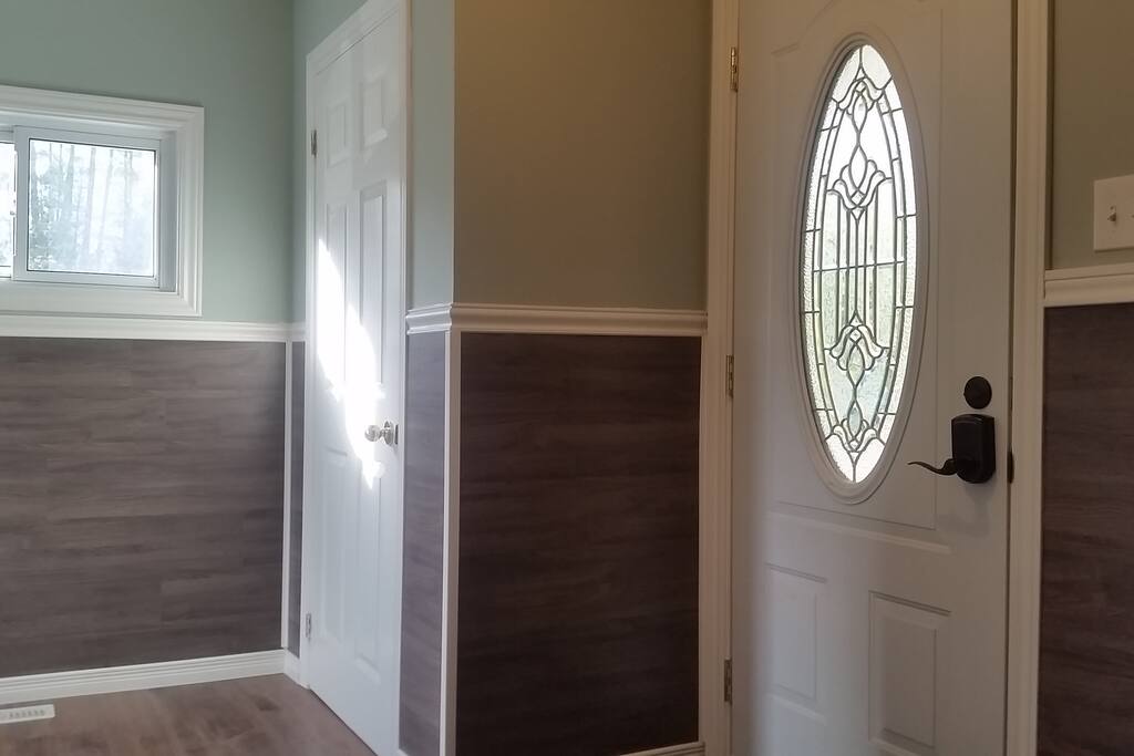 Shared entrance at ground level, with shared laundry facilities.