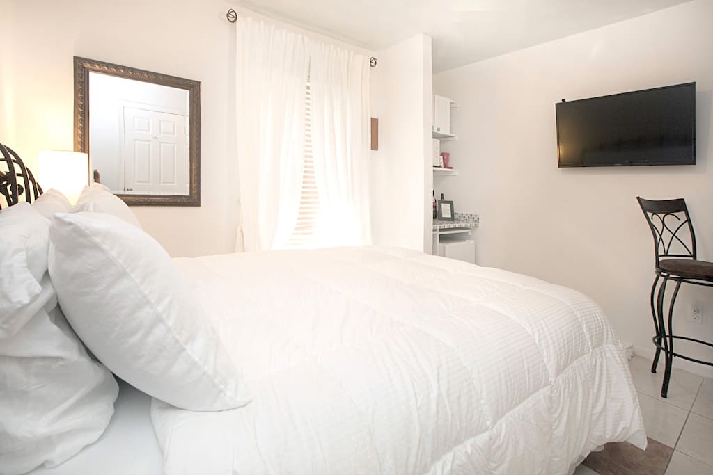 Your room with pillow top Queen sized bed.