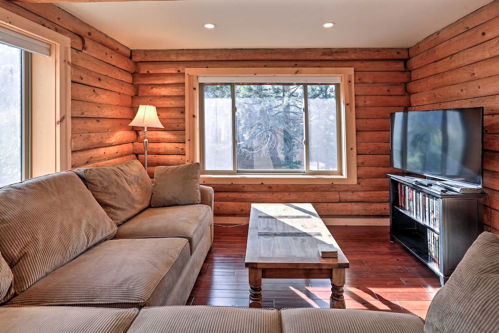 Relax on the L-shaped couch and watch shows on the flat-screen cable TV.