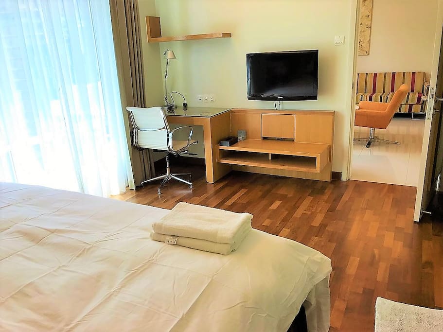 Room with TV and desk