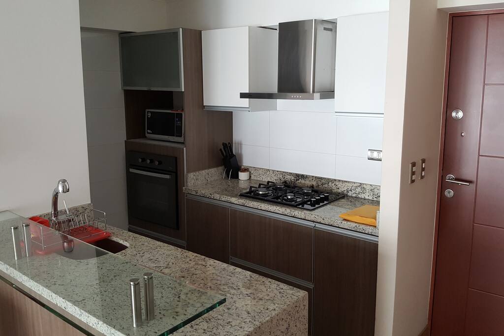 Open plan kitchen fully equipped