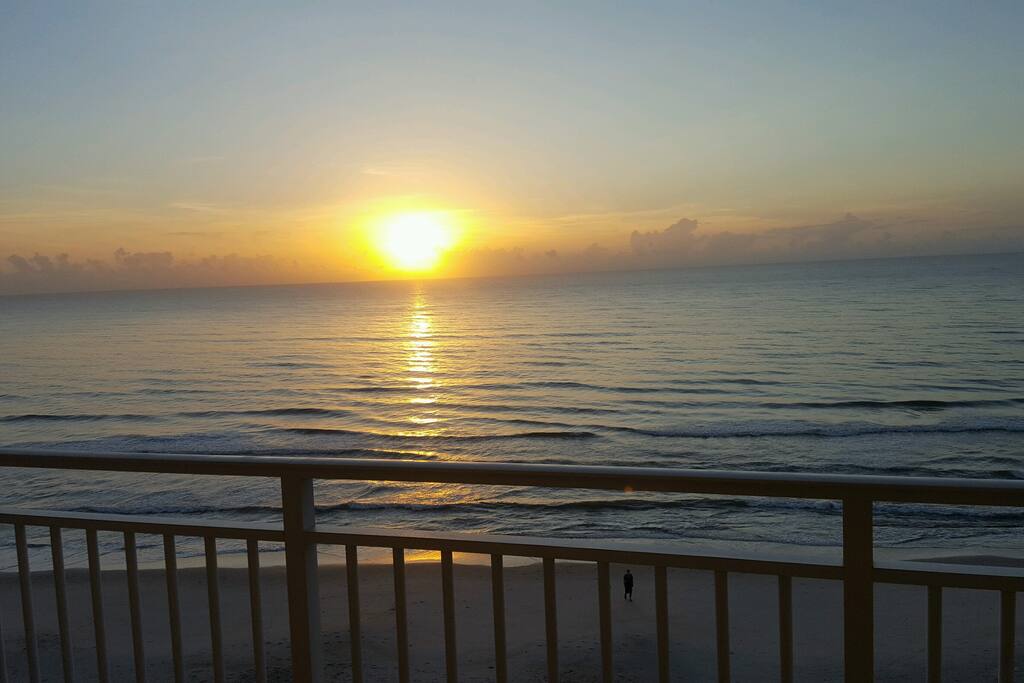 Enjoy sunrise from balcony with morning coffee