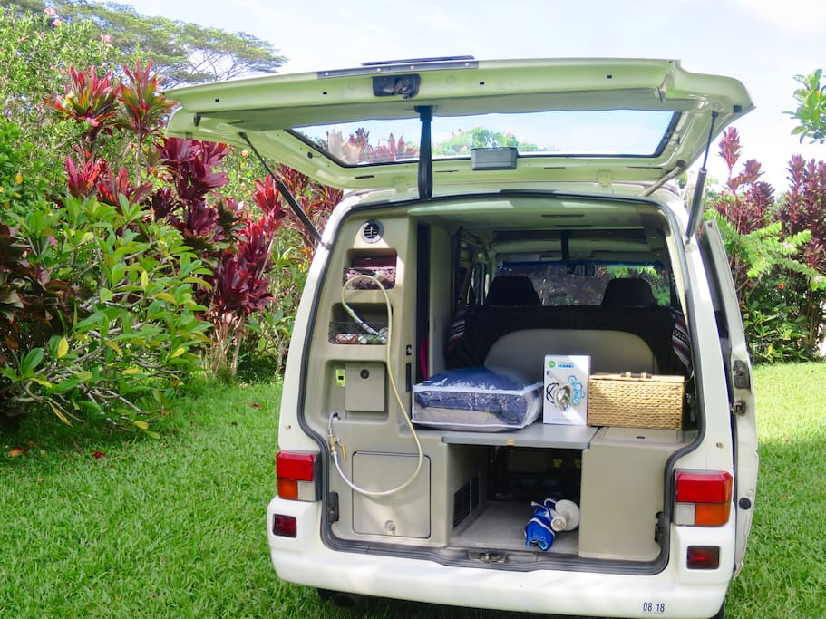 Shower head in the back great for cooling down, fresh water rinse, keeping sand off of you and out of the van ;-)