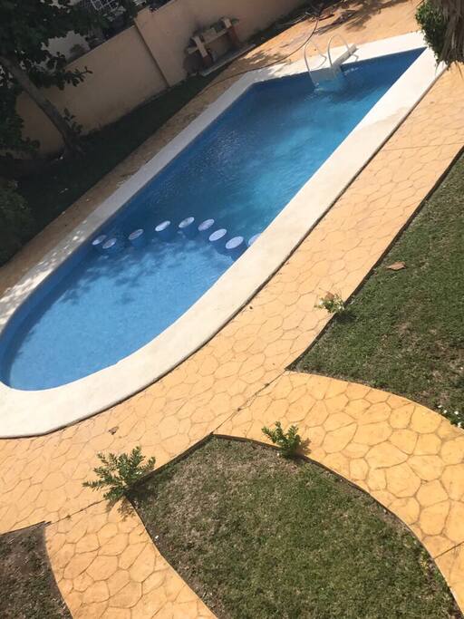 The pool is shared between 5 families and is open until 10pm every night