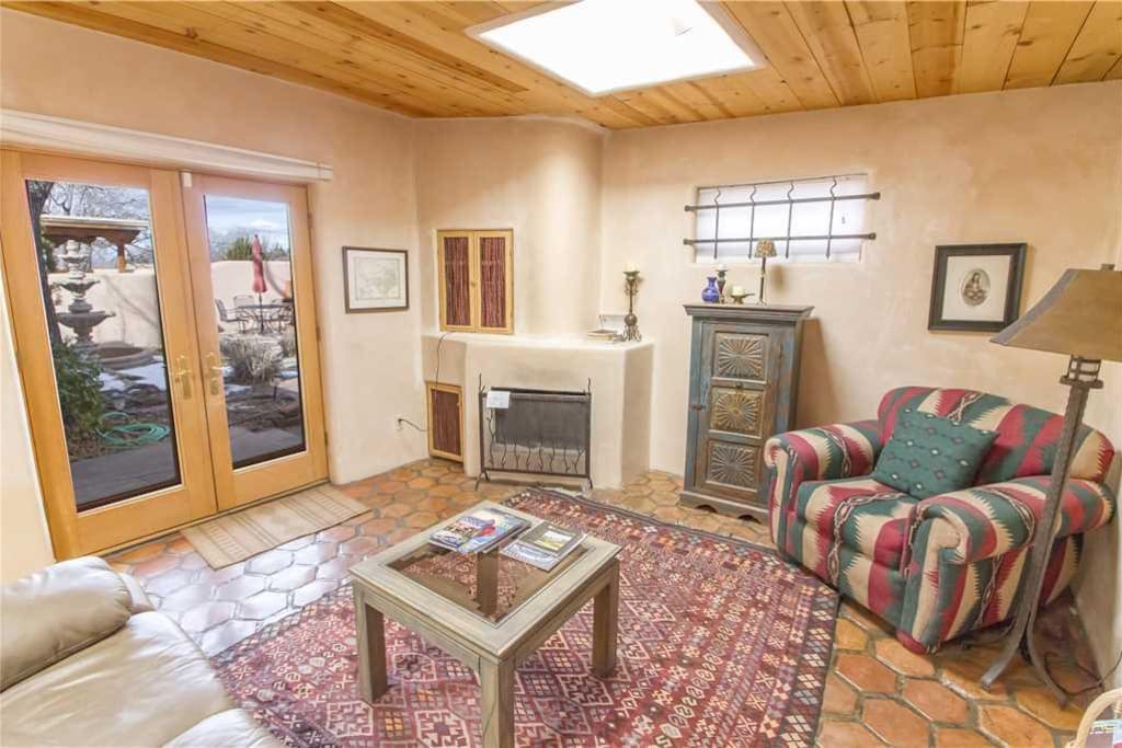 Grab a book or magazine and enjoy the warmth of the living room fireplace.