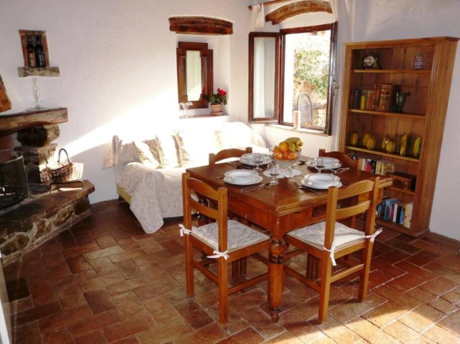 This is the kitchen/dining/living space. It's bright and sunny at breakfast time, and has a lovely fireplace for those chilly Autumn evenings