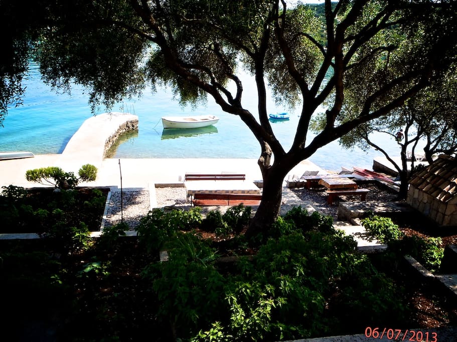 The terrace in front of the house with sea view