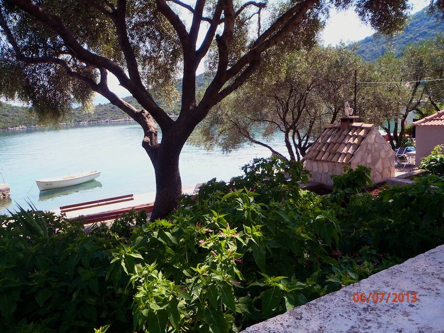 The terrace in front of the house with sea view