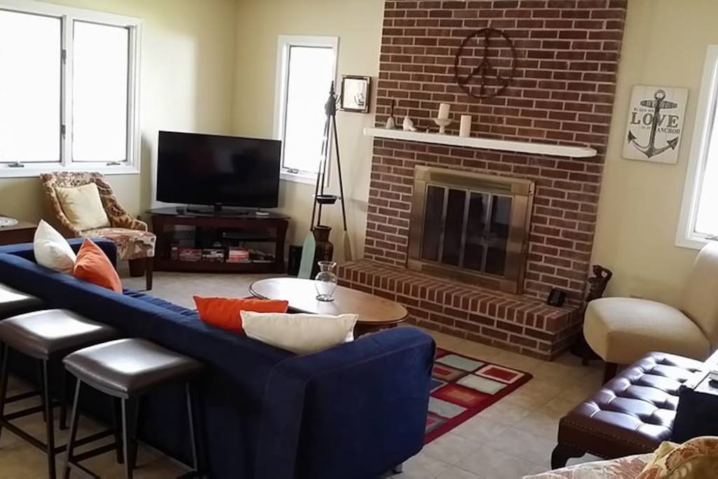 Cozy up to someone special in the living room! Cable and smart tv provided.