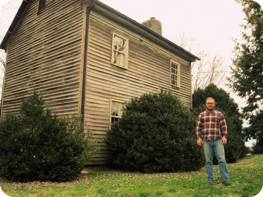 Brad, owner & host in front of the house