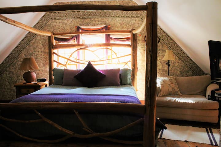 Attic Treasures premium King suite with private bathroom. soaking tub and shower