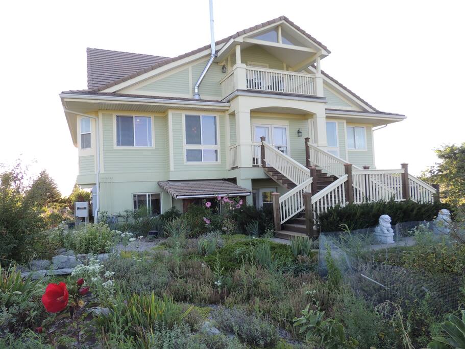 Native gardens surround the condo building that attract bees and butterfiies.